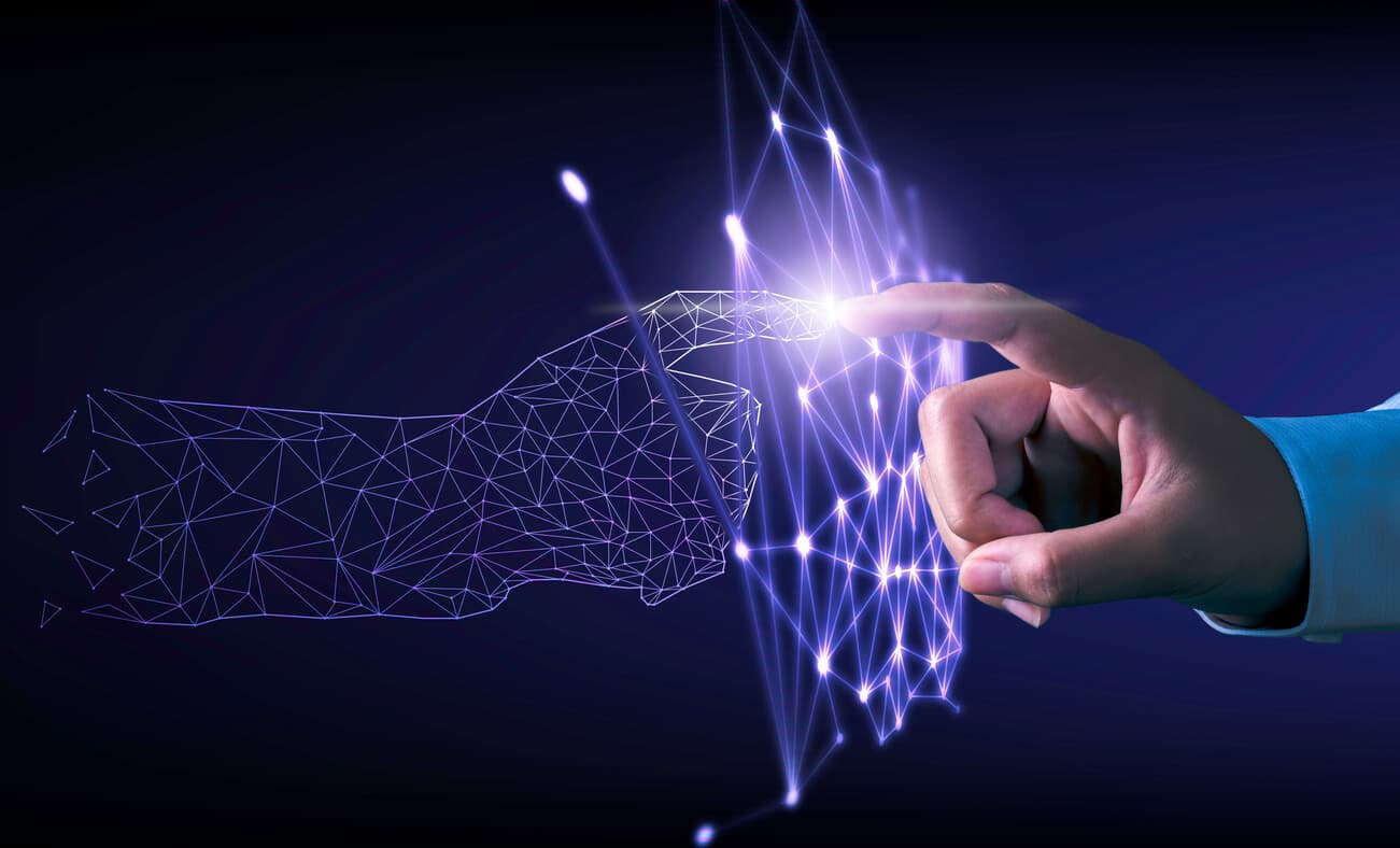 a hand touching a glowing object with a dark background,