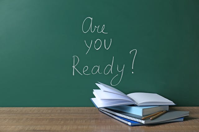 A blackboard with "Are you Ready?" written on it
